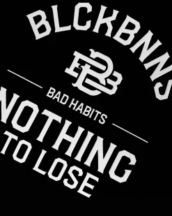 BAD HABITS T-SHIRT | Zwart